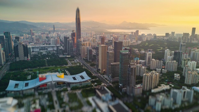深圳城市景观KK100建筑日落天空市中心市政厅航拍全景4k倾斜移位时间推移中国