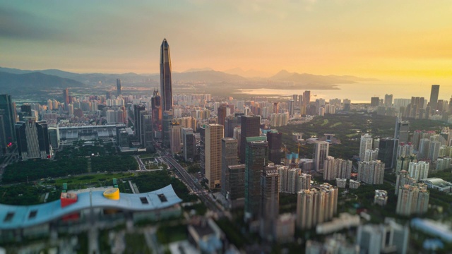 详情图-深圳城市景观KK100建筑日落天空市中心市政厅航拍全景4k倾斜移位时间推移中国