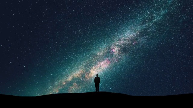 詳情圖-星空背景上的男人剪影。時(shí)間流逝