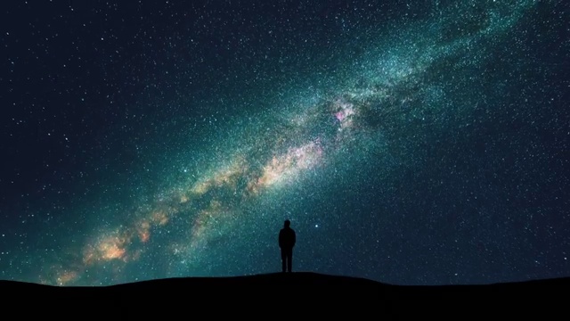詳情圖-星空背景上的男人剪影。時(shí)間流逝