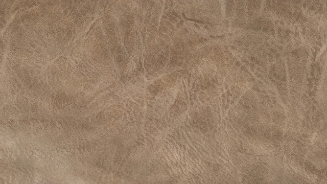 详情图-旋转棕色皮革纹理特写可以用作背景。前视图。