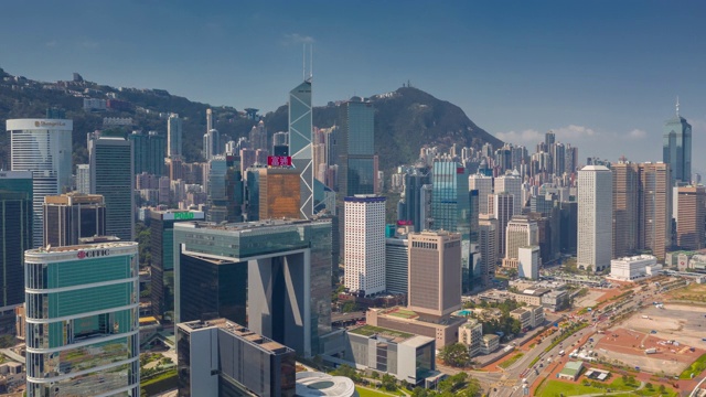 詳情圖-飛越香港市區(qū)維多利亞山頂晴天空中全景圖，時間間隔為4k