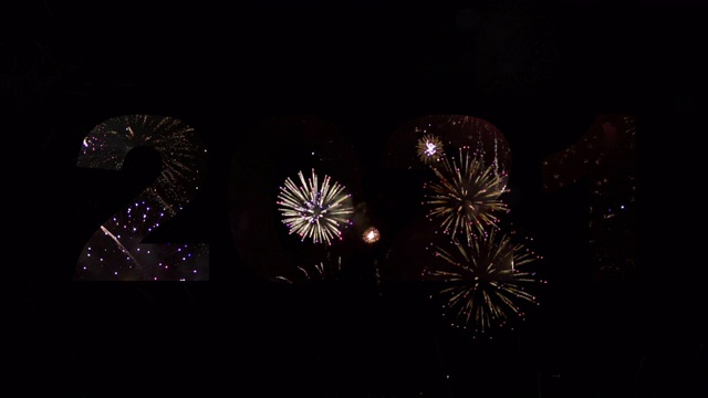 詳情圖-“2021年新年快樂(lè)”的文字出現(xiàn)在精彩的煙花前，“2021年煙花表演”