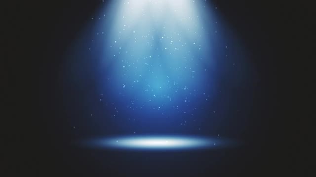 舞台灯光在蓝色演播室闪烁。大聚光灯从空中照亮了这景色。舞台上闪烁着光芒的灯光。所有的灯光都聚集在一个点上。表演艺术，派对，灯光，事件，庆典，UFO，瞬间移动的概念