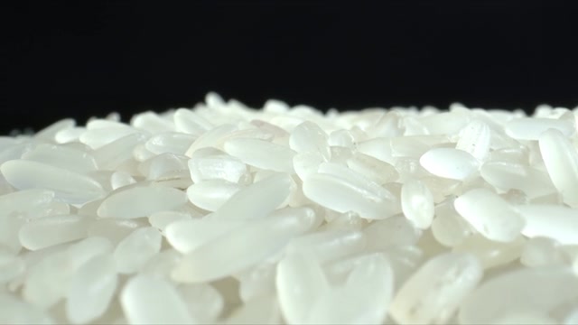 詳情圖-白米粒特寫。堆大米。食品的背景。