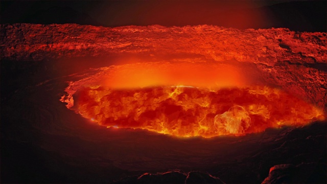 詳情圖-火山爆發(fā)的紅色巖漿。從火山頂部流出的熾熱的紅色熔巖