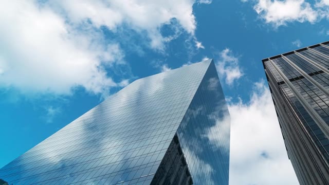詳情圖-時間流逝高層企業(yè)建筑摩天大樓的低角度