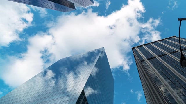 詳情圖-時間流逝高層企業(yè)建筑摩天大樓的低角度