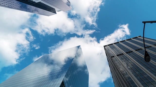 詳情圖-時間流逝高層企業(yè)建筑摩天大樓的低角度