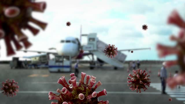 旅客在机场登机时，冠状病毒漂浮在空中。Covid19