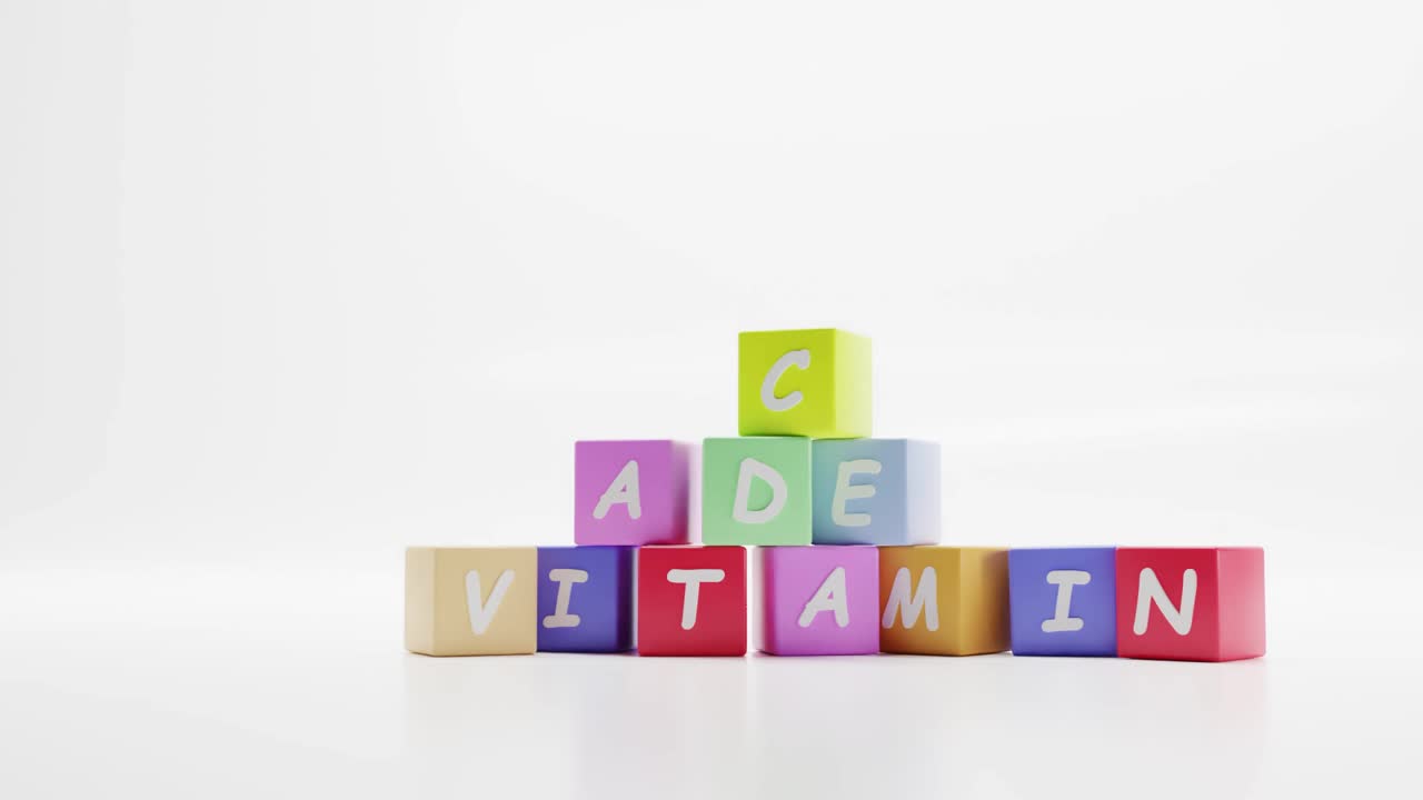 单词维生素，药丸A C D E彩色方块，儿童教育游戏与字母有关的健康和药物。卡通塔，金字塔的方块与动态的球和球在白色的背景