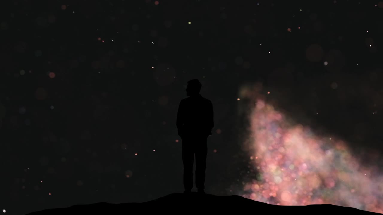 这个人站在宇宙粒子飞行的背景上。慢动作