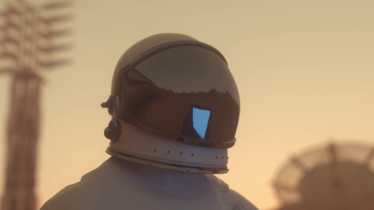 火星殖民的概念。宇航员在其中一个行星上的太空殖民地用他的科学笔记本电脑工作