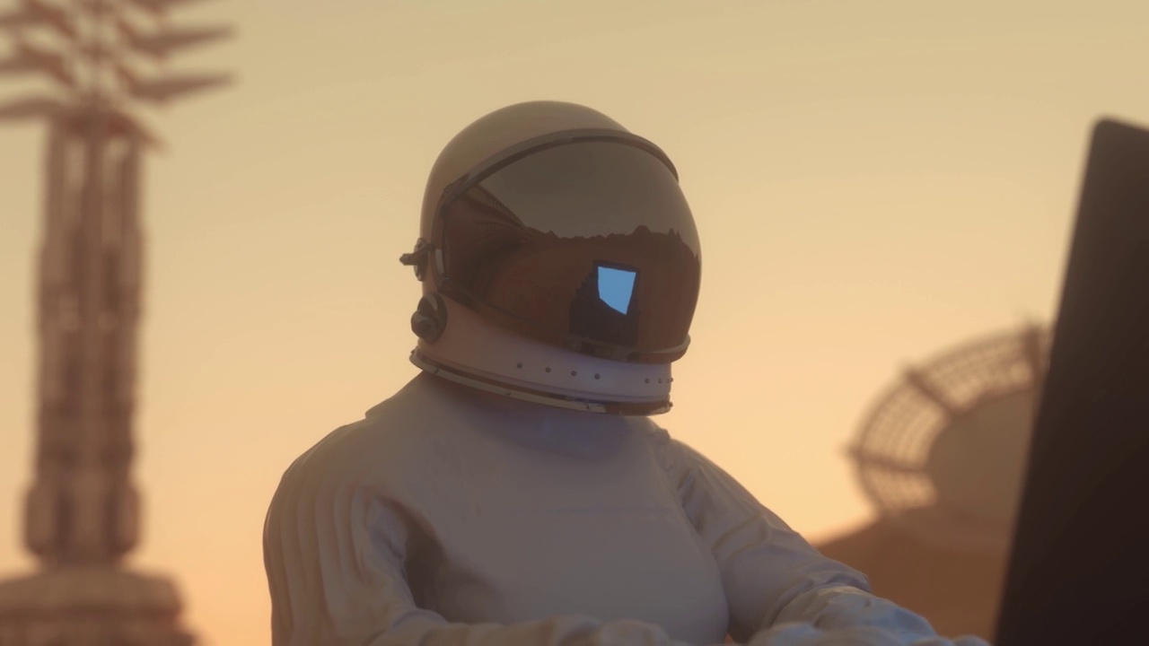 详情图-火星殖民的概念。宇航员在其中一个行星上的太空殖民地用他的科学笔记本电脑工作