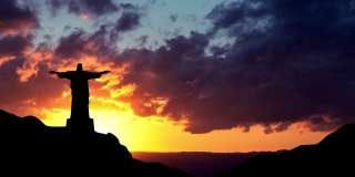 日落在基督救世主在里约热内卢里约热内卢与Corcovado山。