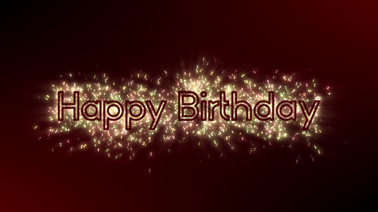 生日快乐闪闪发光的文字动画与优雅的生日快乐信件写在粒子上，在暗红色黑色的背景与闪闪发光的烟花周年纪念信件节日烟花雨