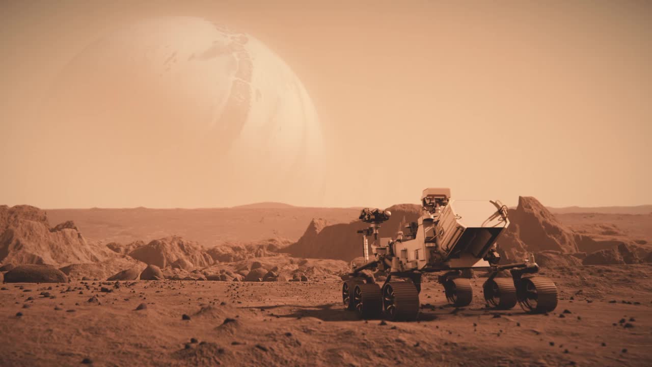 美國(guó)宇航局的火星漫游者穿越火星表面向土星進(jìn)發(fā)的鏡頭