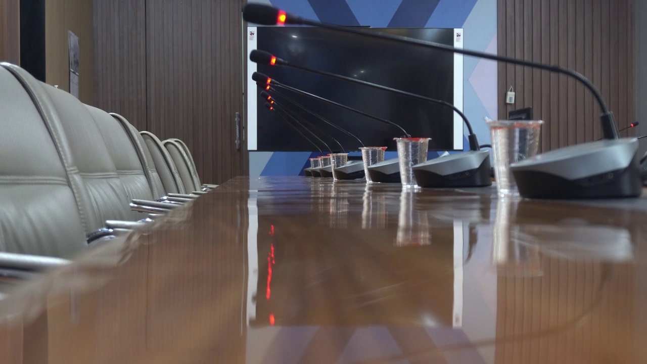concept and idea of ​​a table mic microphone in a meeting room for business meeting seminary and tel