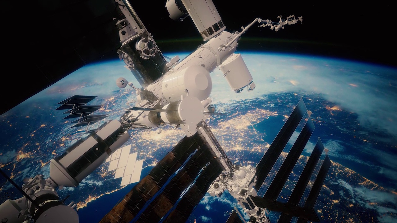 宇宙飞船正在绕地球飞行。地球和空间站的景象