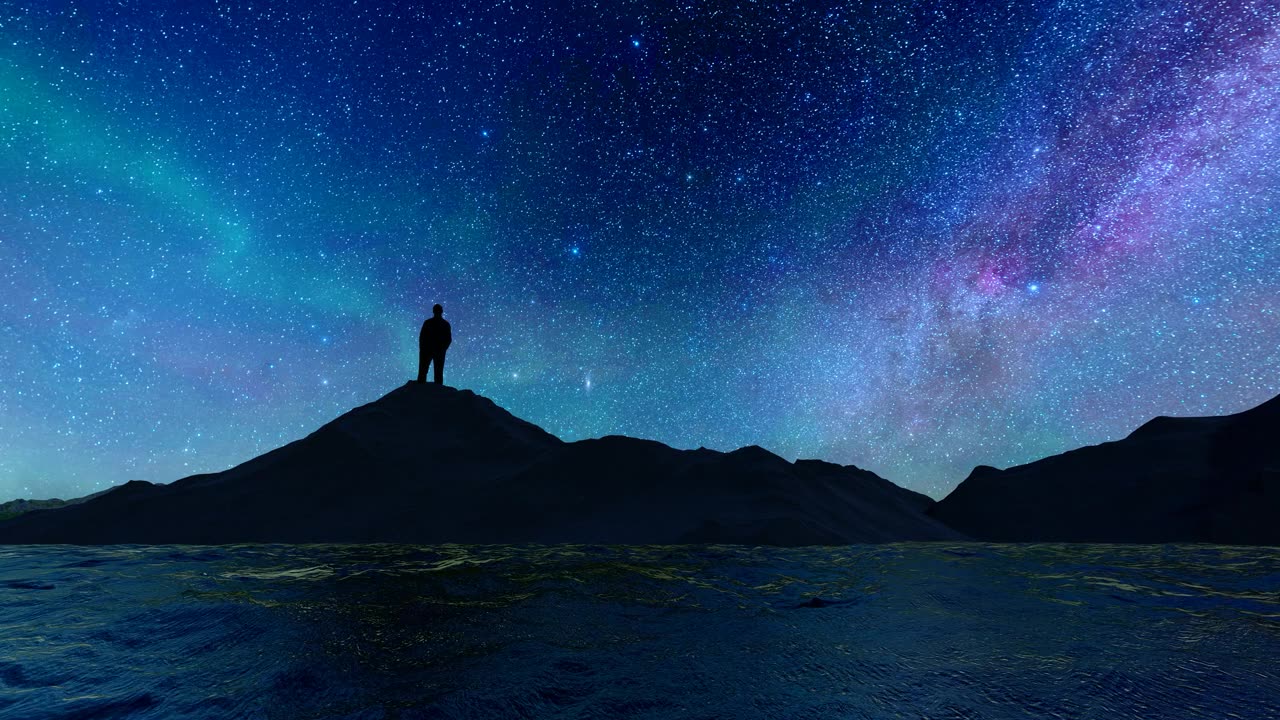 详情图-一个人在山顶仰望星空的剪影