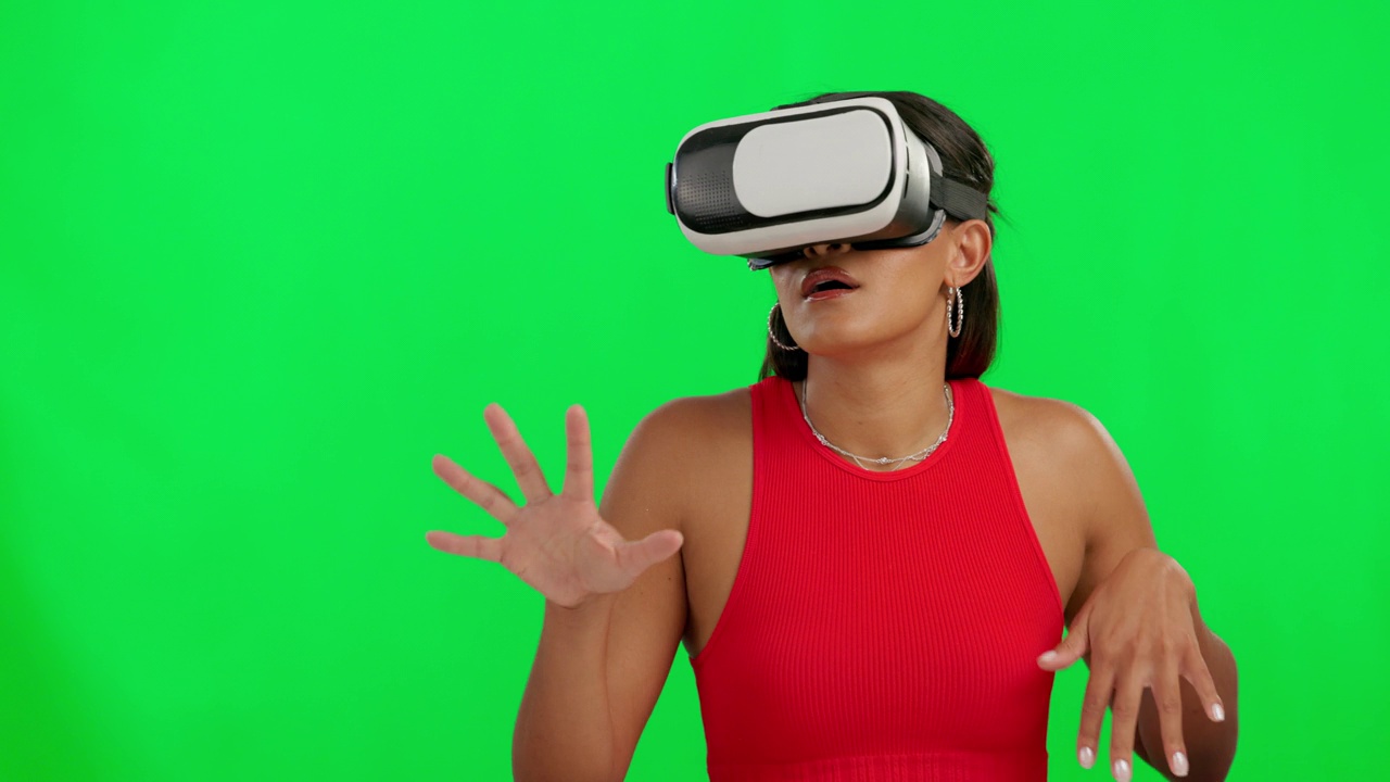 女人，绿屏和vr眼镜在演播室搜索，虚拟世界游戏和手势的模型。女孩，模特或网络游戏玩家与增强现实技术的3d视频，用户体验和移动