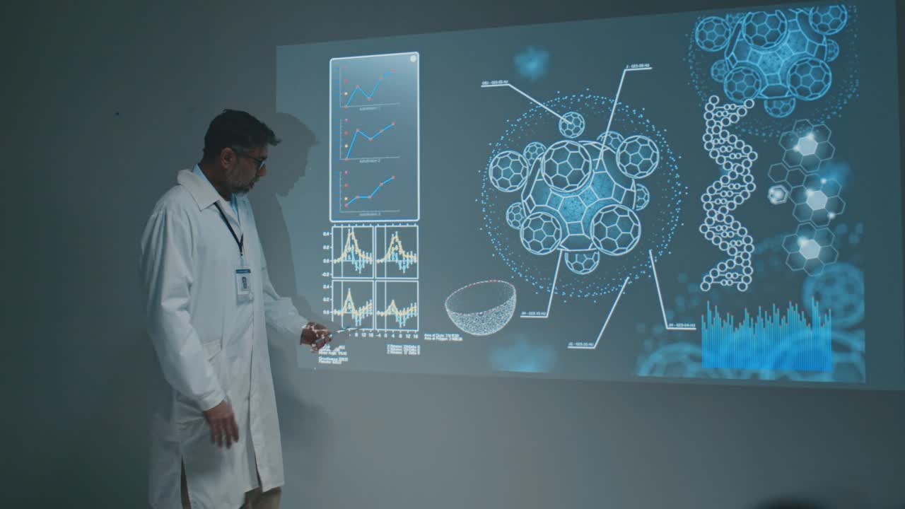 印度男科学家在会议上介绍微生物学的新研究
