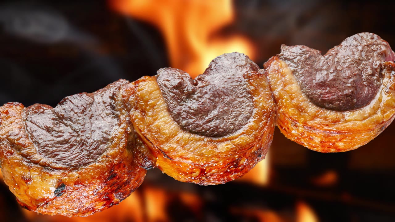 詳情圖-在烤肉架上烤著Picanha