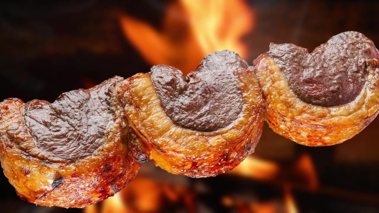 詳情圖-在烤肉架上烤著Picanha