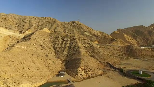 马斯喀特湾鸟瞰图，潜水胜地，一日游和休闲区，清澈的印度洋水，海滩和蓝色的泻湖，阿曼，阿拉伯半岛上的苏丹国，4k超高清