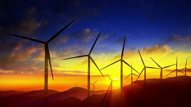 美丽的风车涡轮机利用清洁，绿色，风能在日出/日落的天空与阳光剪影。绿色能源。高清版