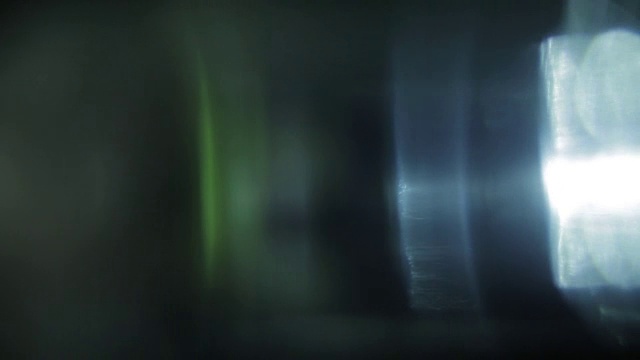 色彩鲜艳的散景。优雅抽象的运动背景。把它与屏幕或添加复合模式以上的视频过渡闪光或造型您的视频
