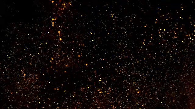 詳情圖-美麗的動(dòng)畫多色飛行閃爍粒子分散在一個(gè)黑色的背景