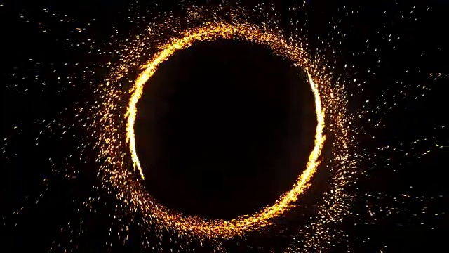 无缝动画抽象的火环火焰烟花燃烧。火花圆形图案或冷火或烟花在黑色背景4k火焰概念。