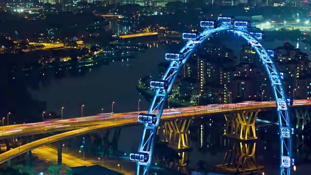 夜晚照亮了新加坡著名的飞行交通大桥道路顶部全景4k时间流逝