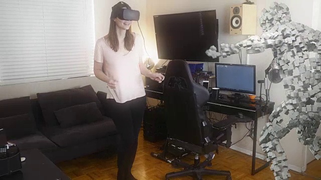 詳情圖-戴著VR眼鏡和虛擬伴侶跳舞的女人。